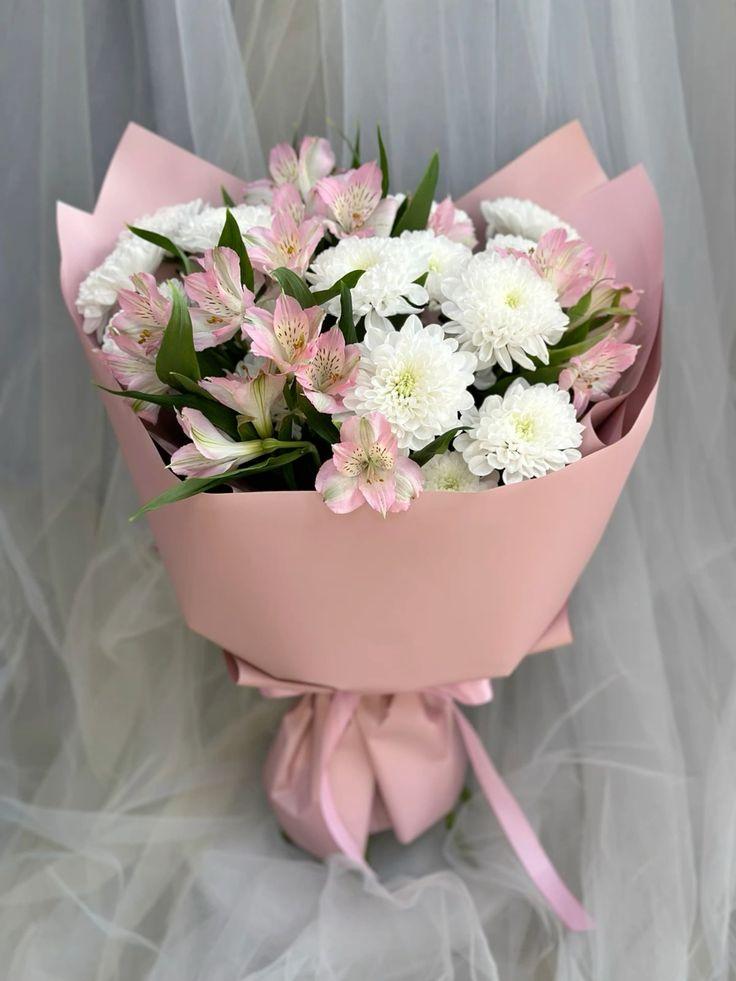 Professional floral arrangement in modern corporate setting